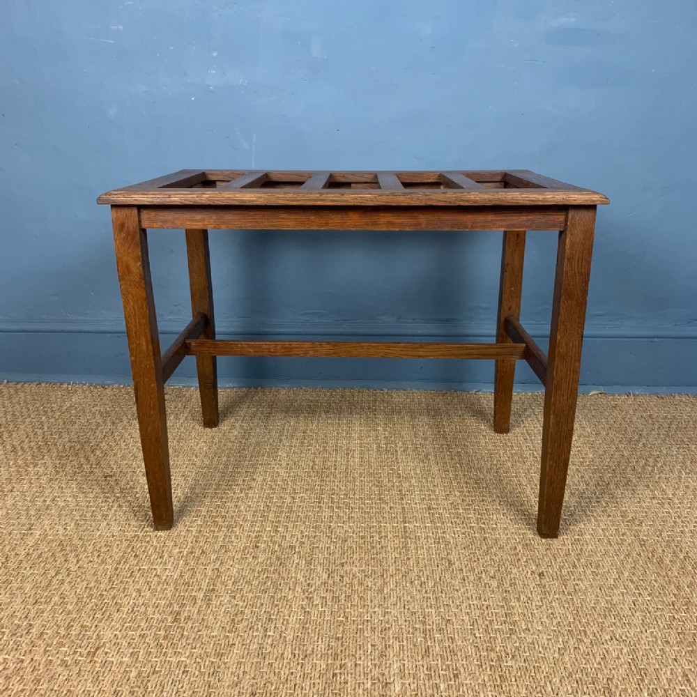 A large Edwardian oak luggage rack circa 1910