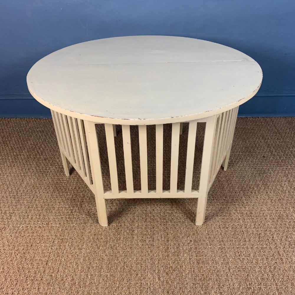 A Glasgow School painted low table circa 1910