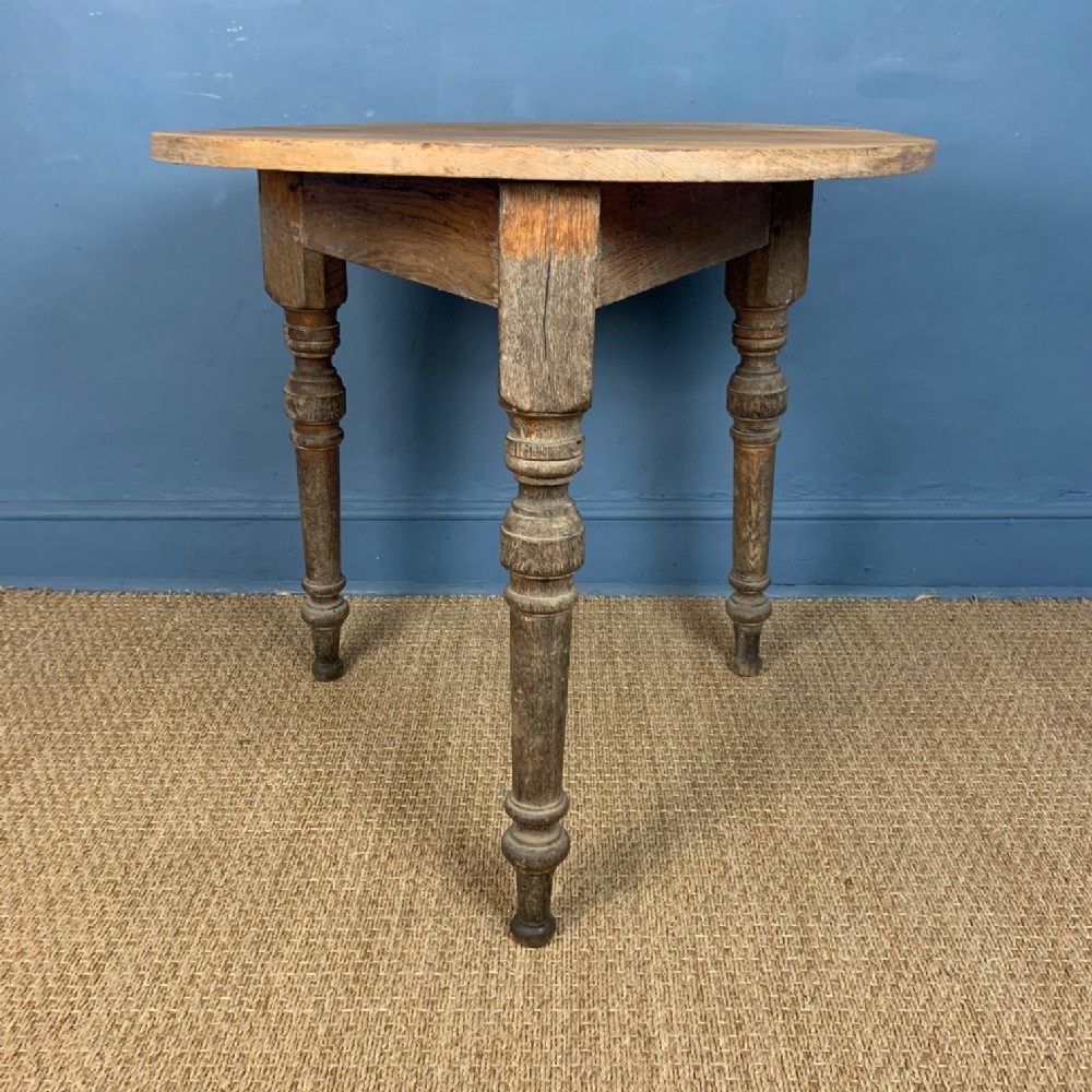 A Victorian pine and oak cricket table circa 1890