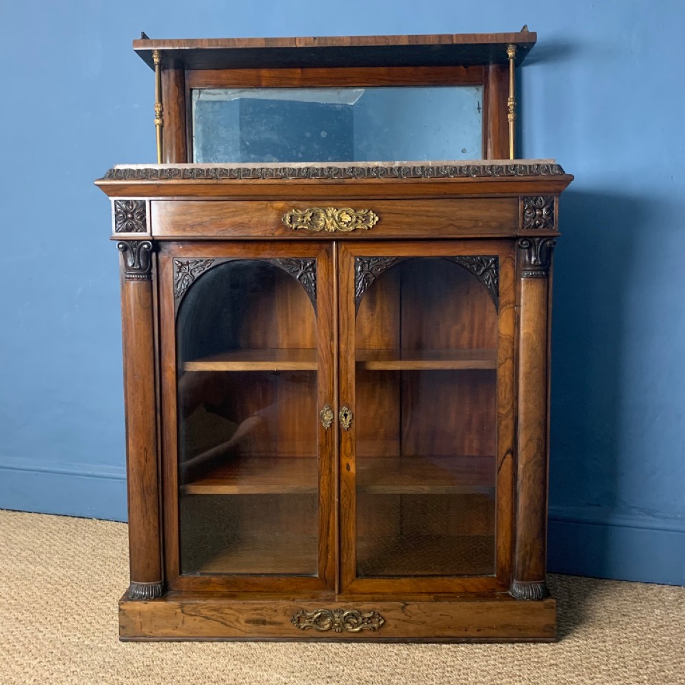 A George IV rosewood library cabinet by Gillows circa 1825