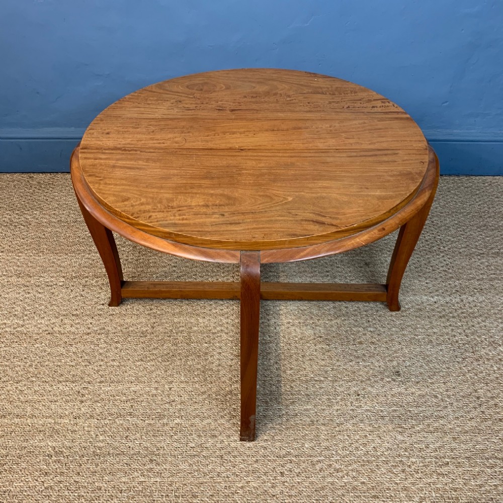 A Ceylonese solid satinwood circular coffee table circa 1920.