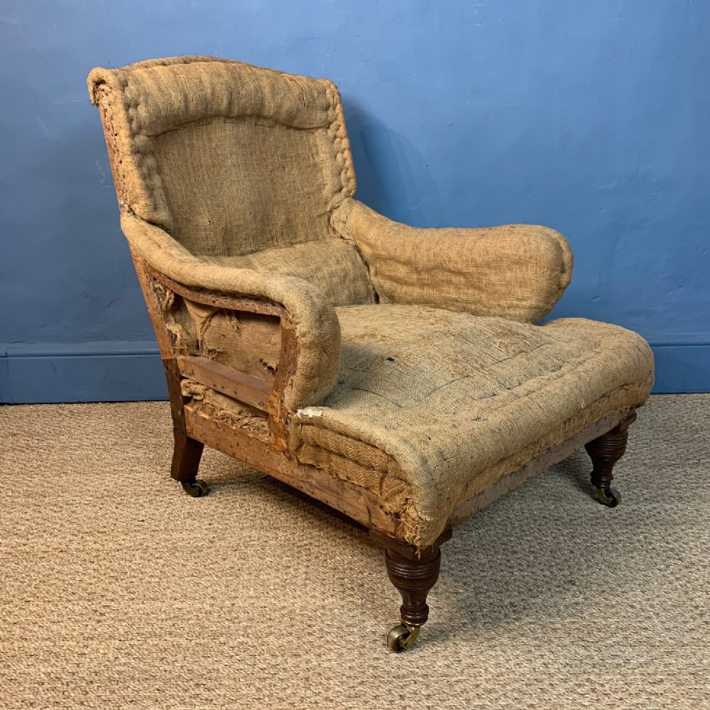 A late Victorian walnut Howard style Bridgwater armchair circa 1900