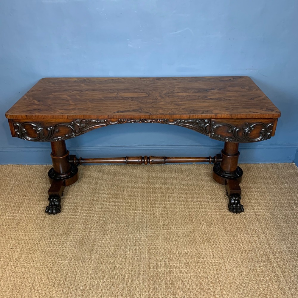An early Victorian rosewood writing table circa 1840