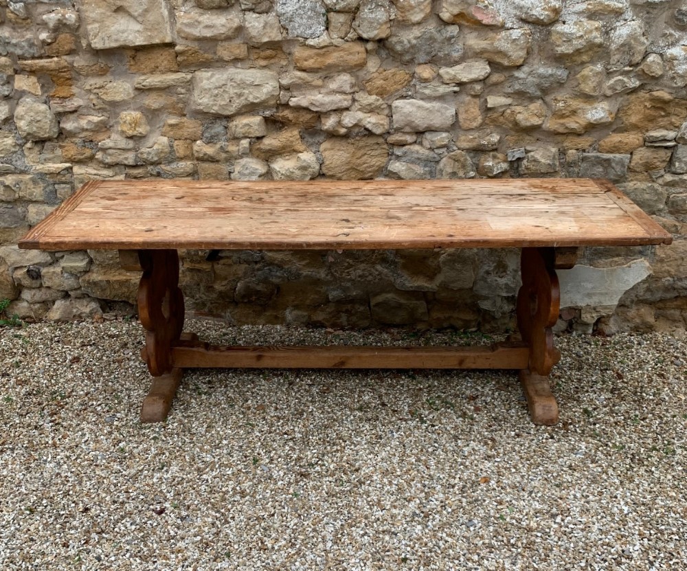 An Arts and Crafts pine table . West Country circa 1910