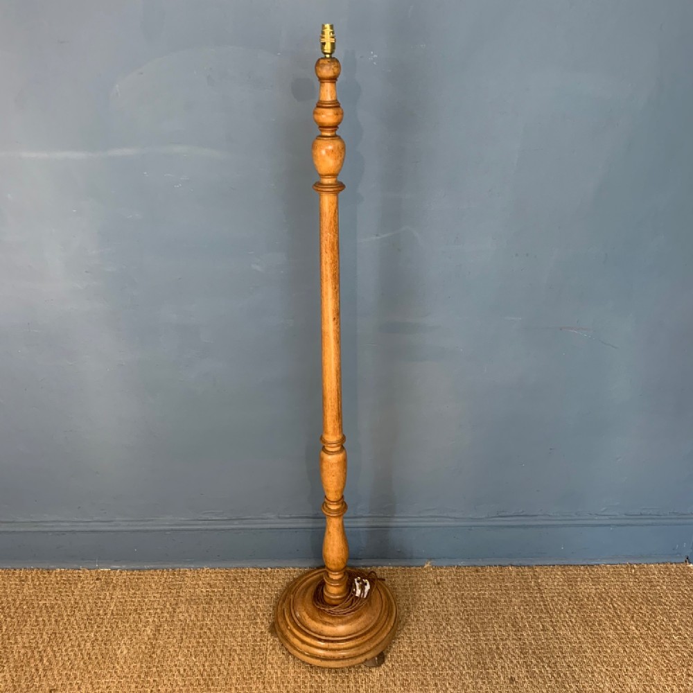 A Heals oak standard lamp circa 1930