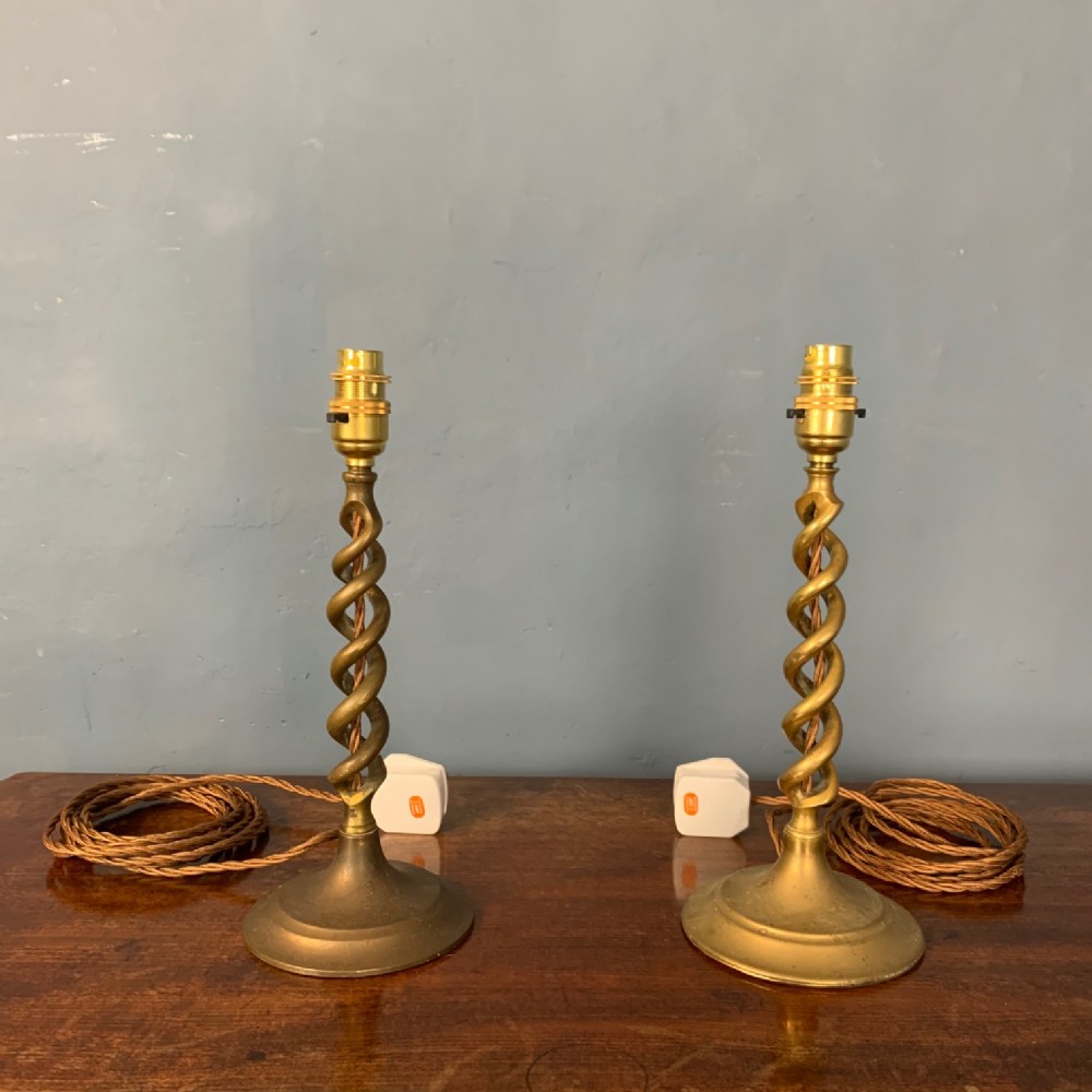 A pair of Edwardian brass twist lamps circa 1910