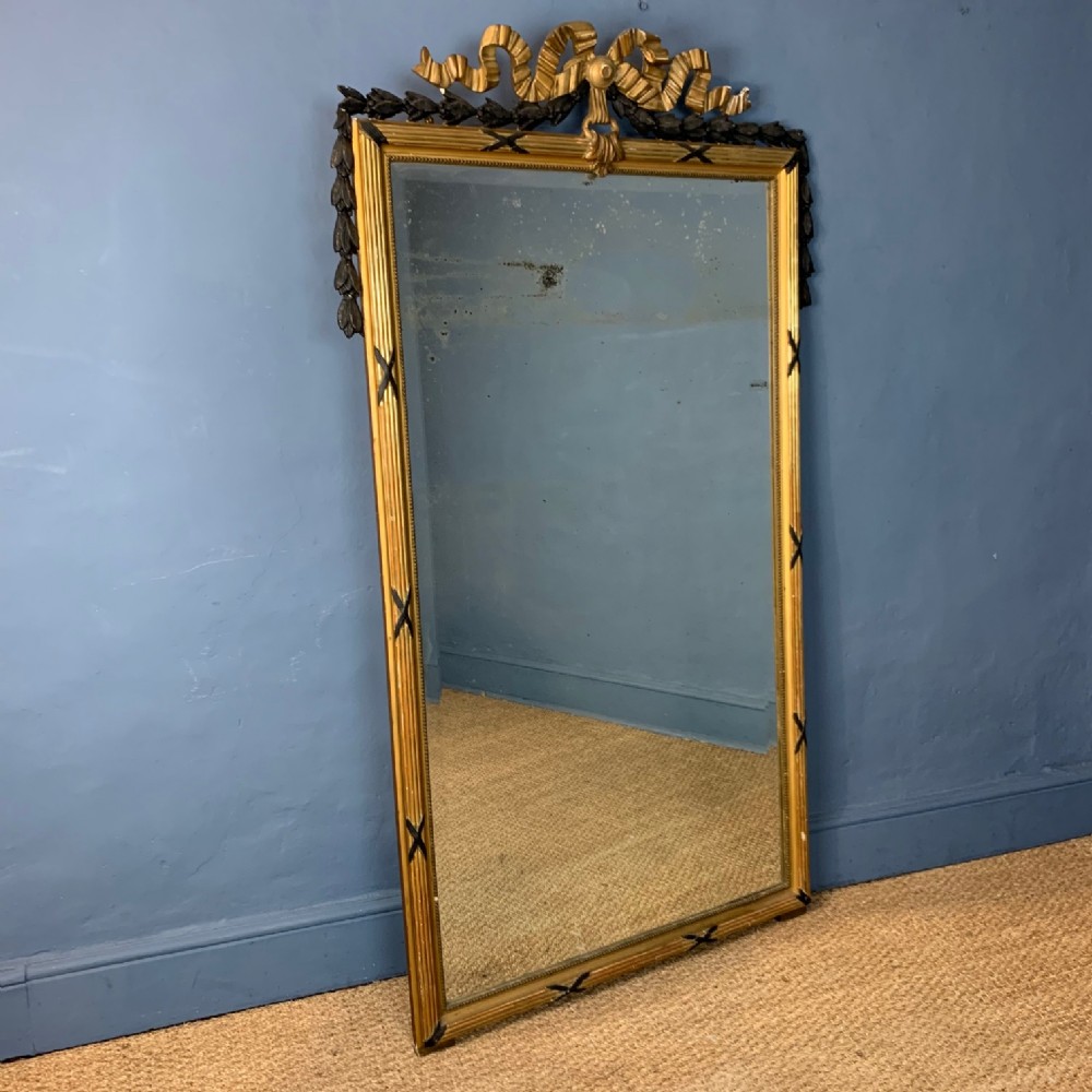 A large early 19th c Italian Empire pier mirror circa 1830