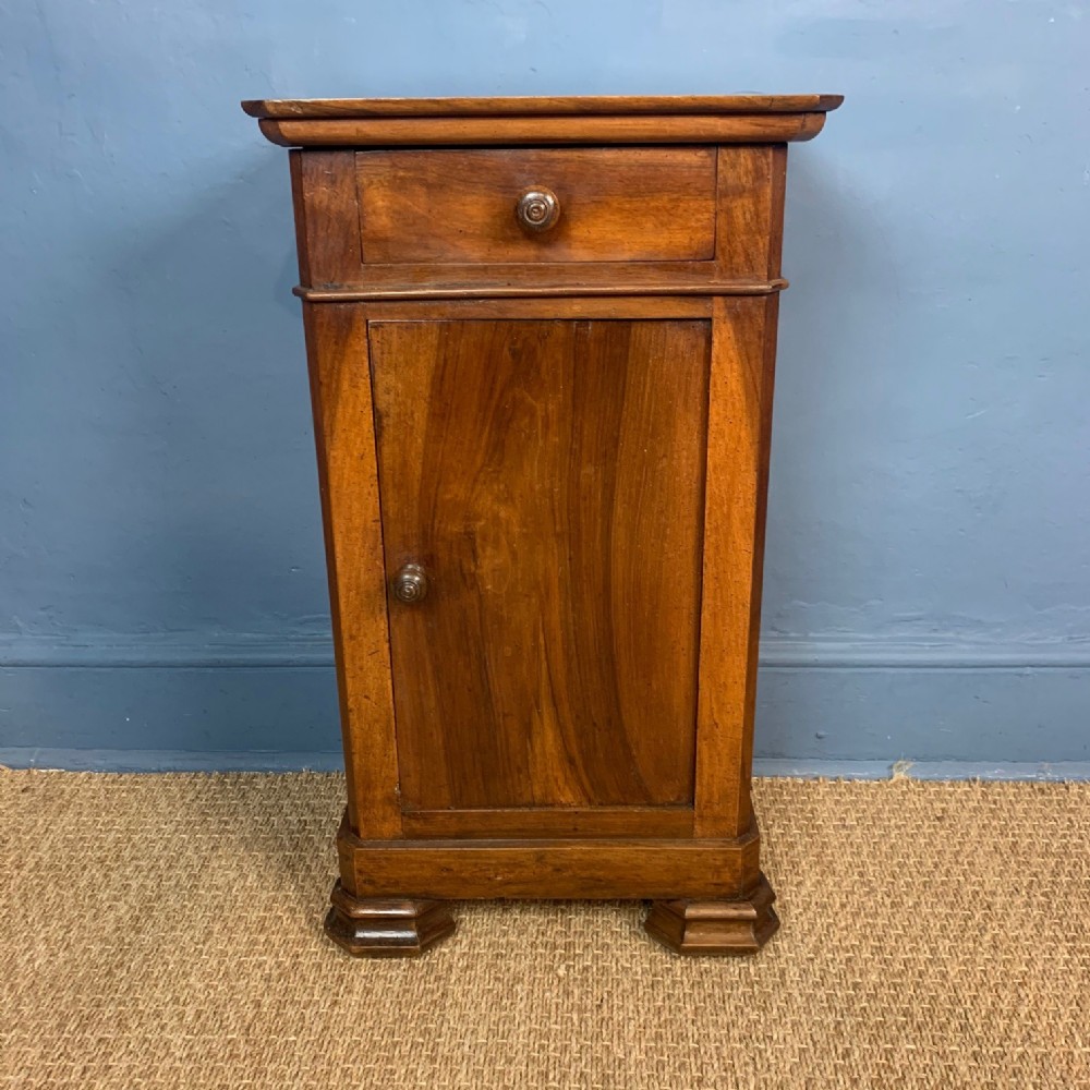 A mid 19th c French walnut bedside table circa 1870