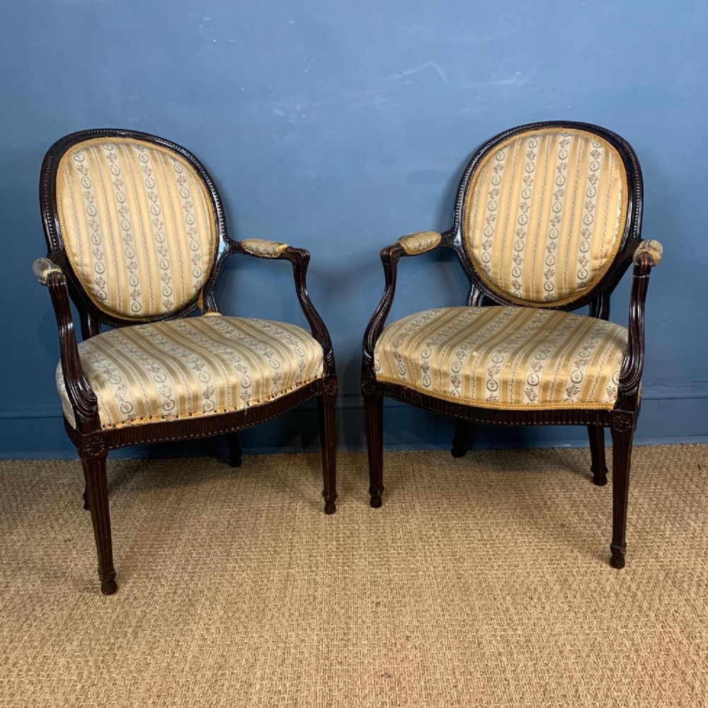 A pair of George 111 mahogany armchairs circa 1780