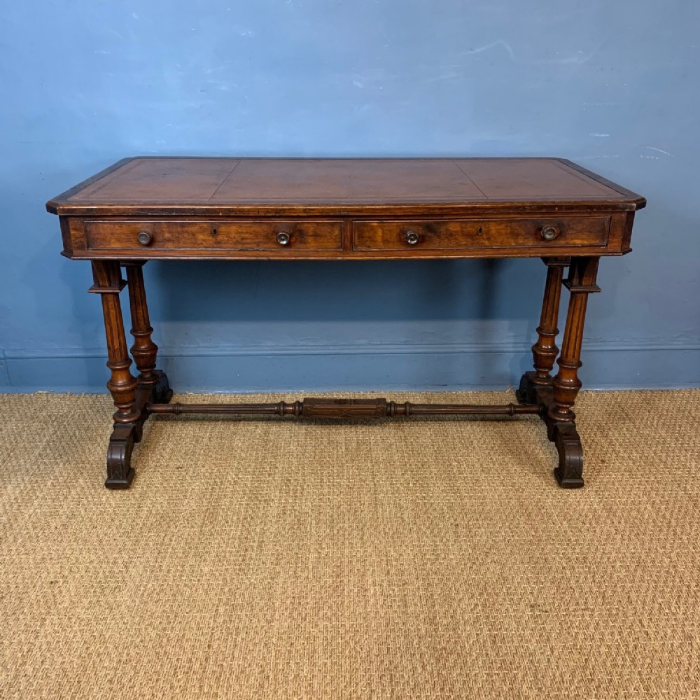 A Victorian Gothic oak writing table circa 1880