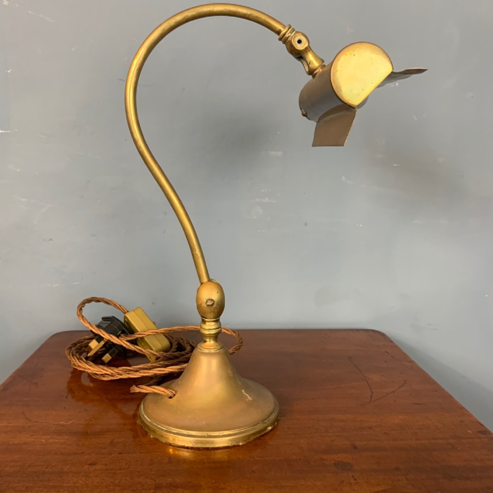 An Edwardian brass adjustable desk lamp circa 1910.