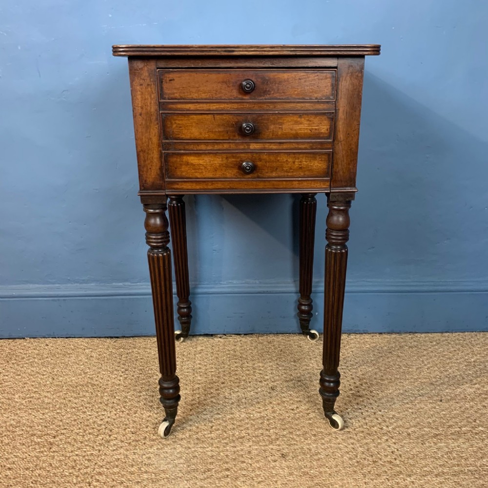 A George IV mahogany bedside table circa 1830