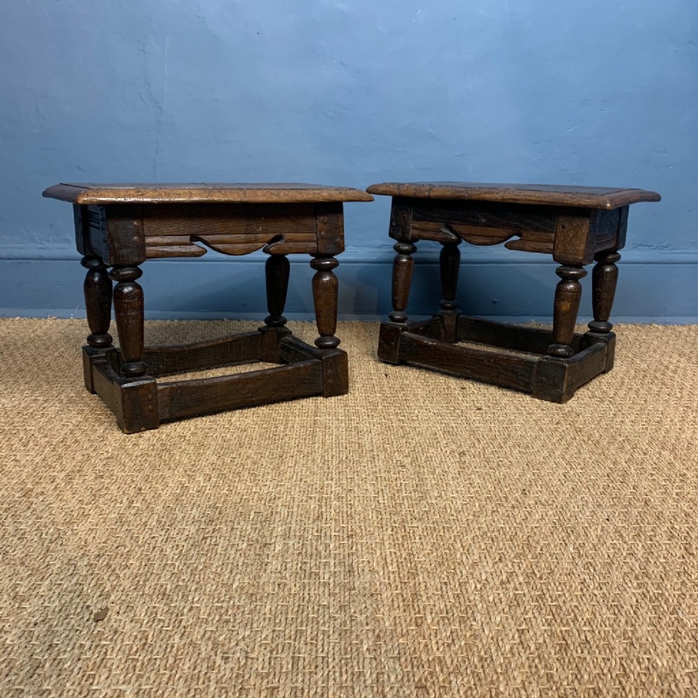A pair of 17th c style oak joint stools circa 1890 .