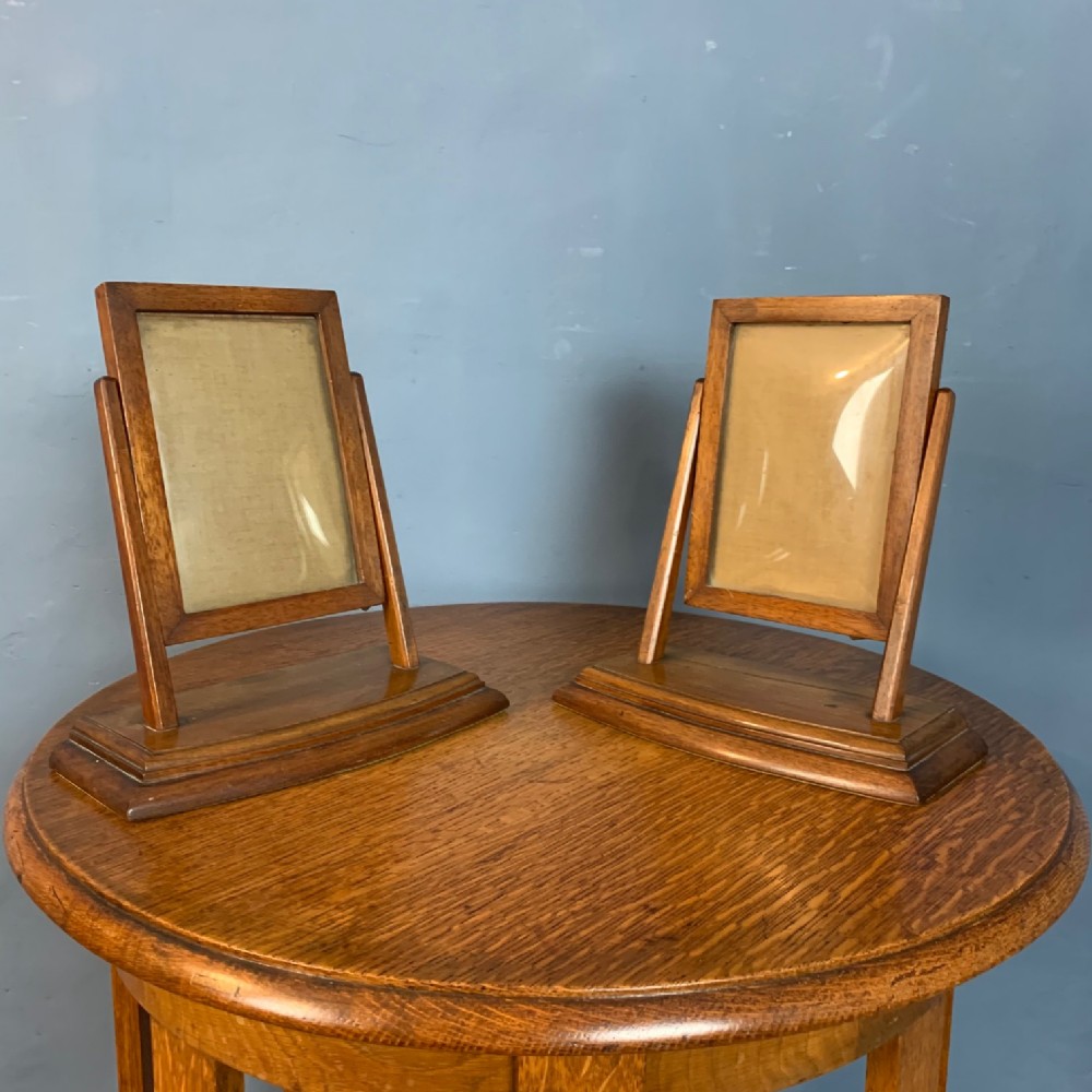 A rare pair of Edwardian walnut photoframes circa 1910