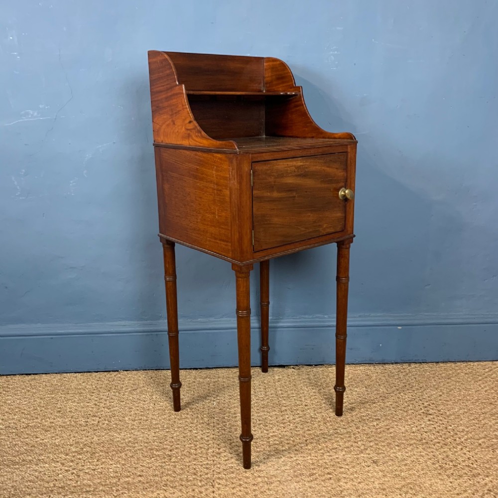 A George 111 mahogany bedside table circa 1800