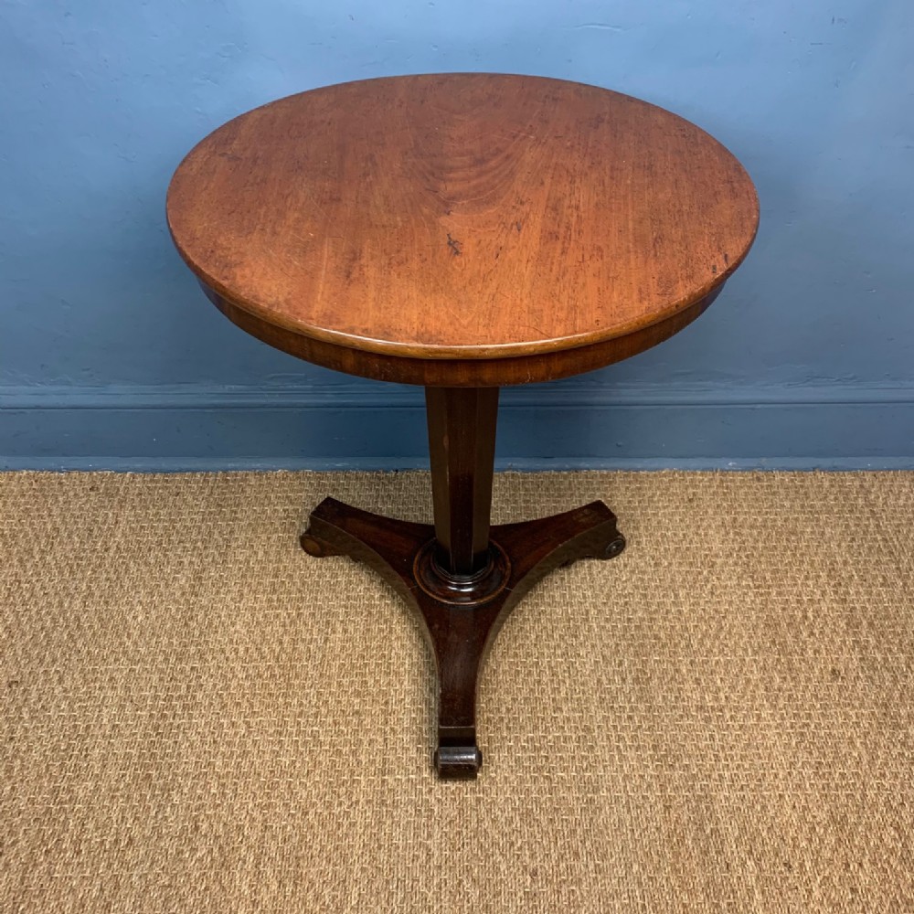 A William IV mahogany circular lamp table circa 1835