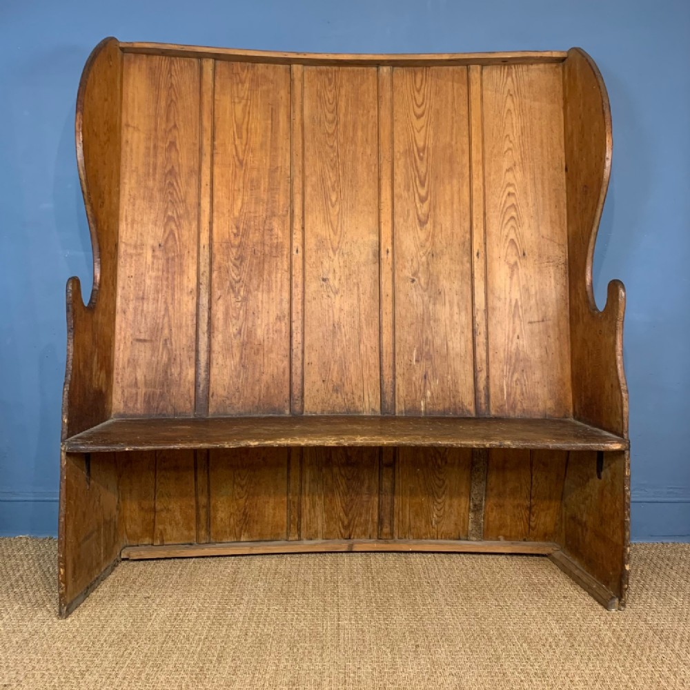 A late Georgian Devon pine settle circa 1820