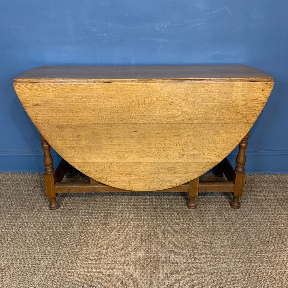 A Heals golden oak gateleg table circa 1930