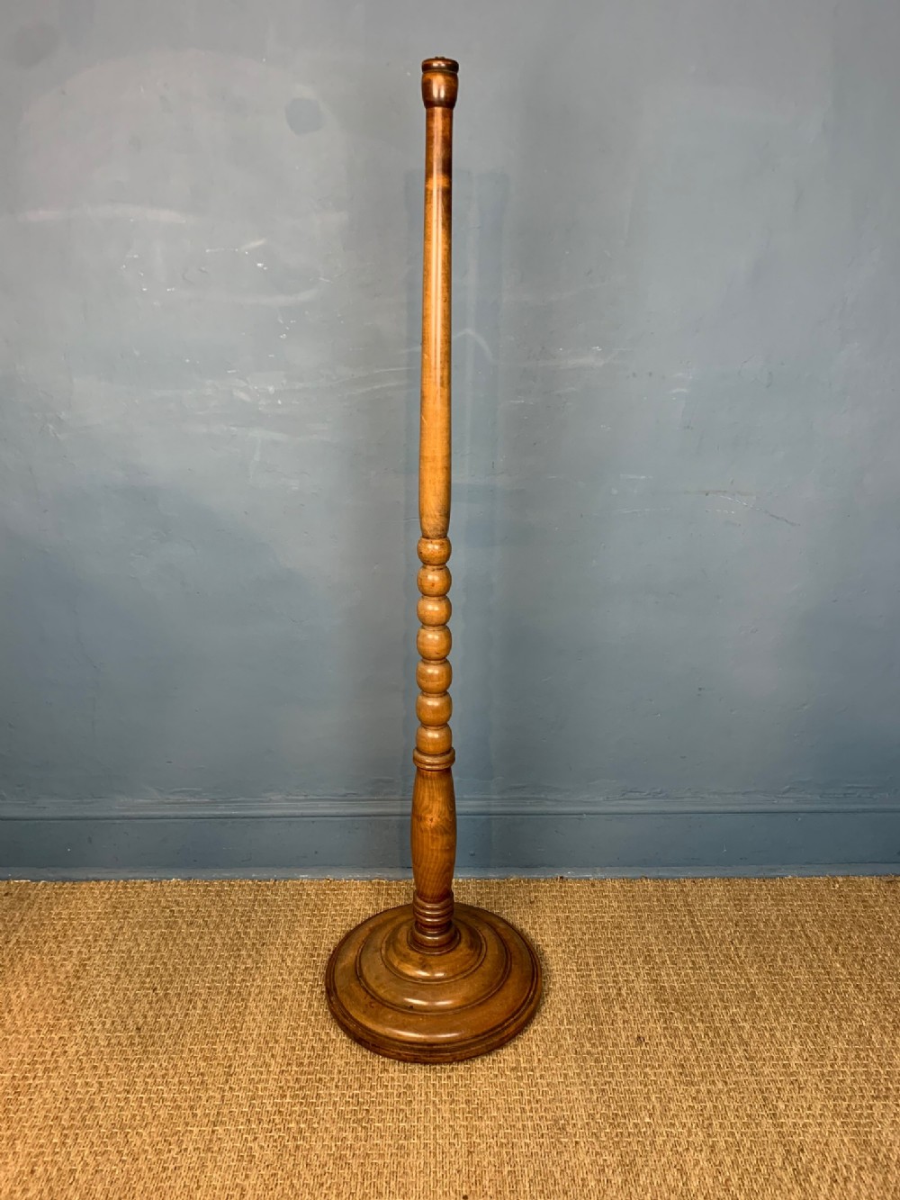 A Heals oak standard lamp circa 1930