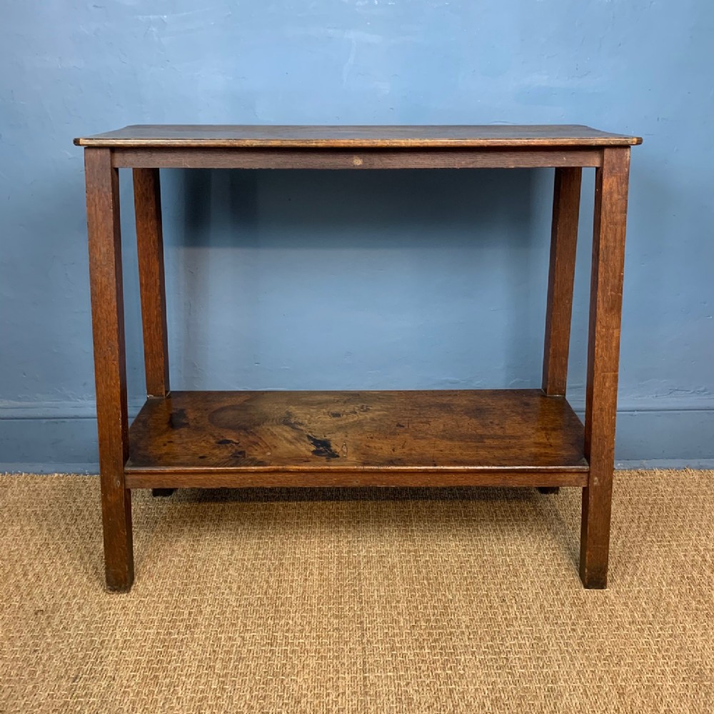 An unusual mid 19th century oak two tier table