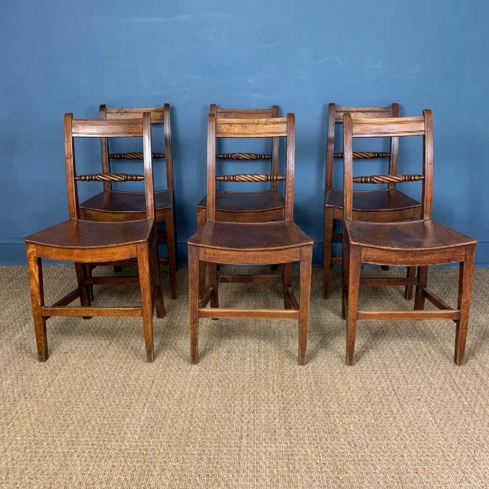 A set of six Regency elm provincial dining chairs circa 1820