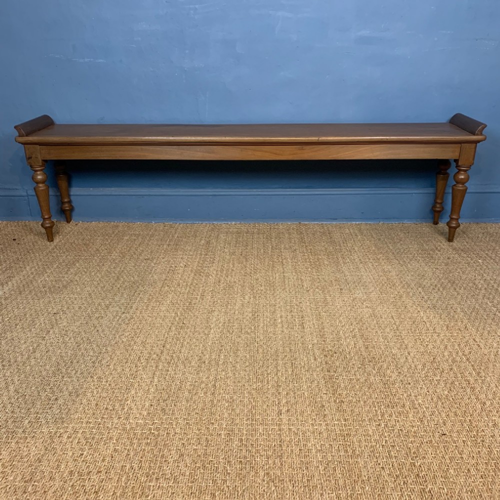 An unusually long Victorian mahogany hall bench circa 1870
