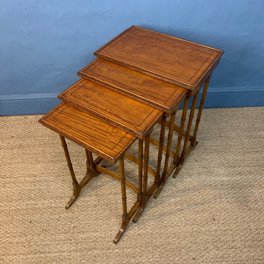 A nest of 4 Edwardian Satinwood tables circa 1910