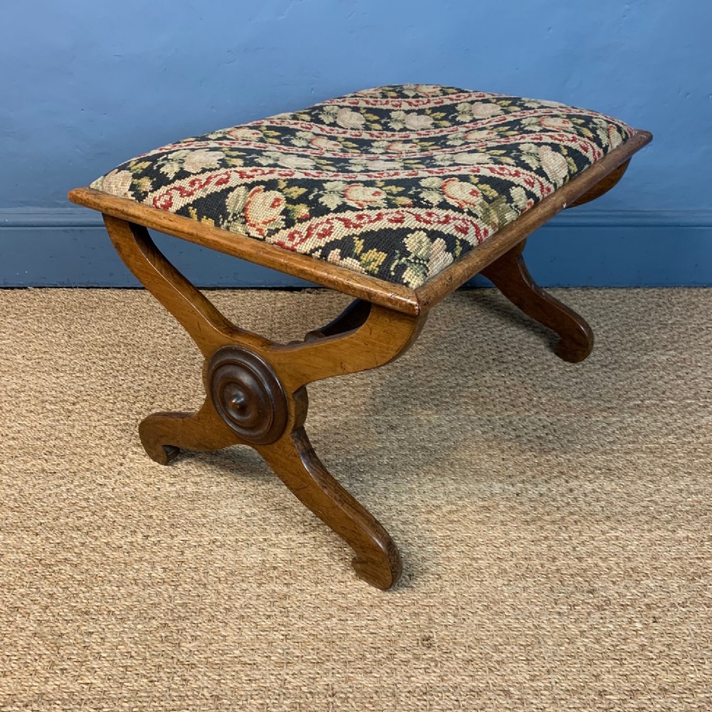 An early Victorian mahogany x-frame stool circa 1850