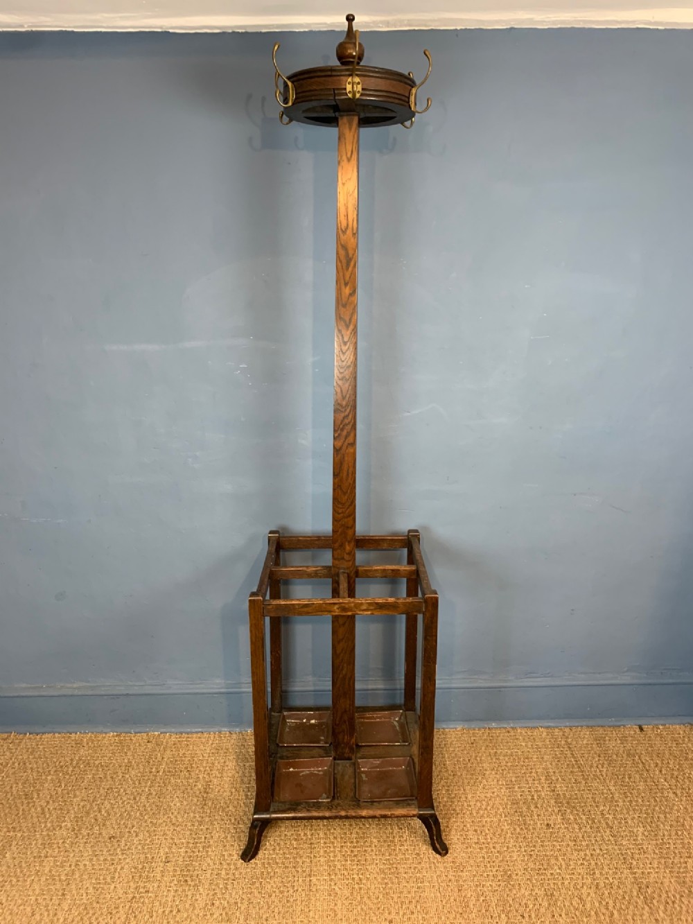 An Edwardian oak coat and stick stand circa 1910