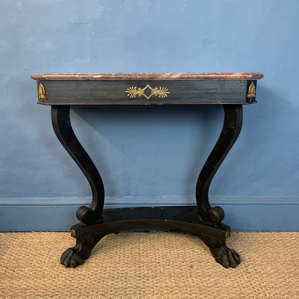 A late Regency ebonised small console table circa 1830 
