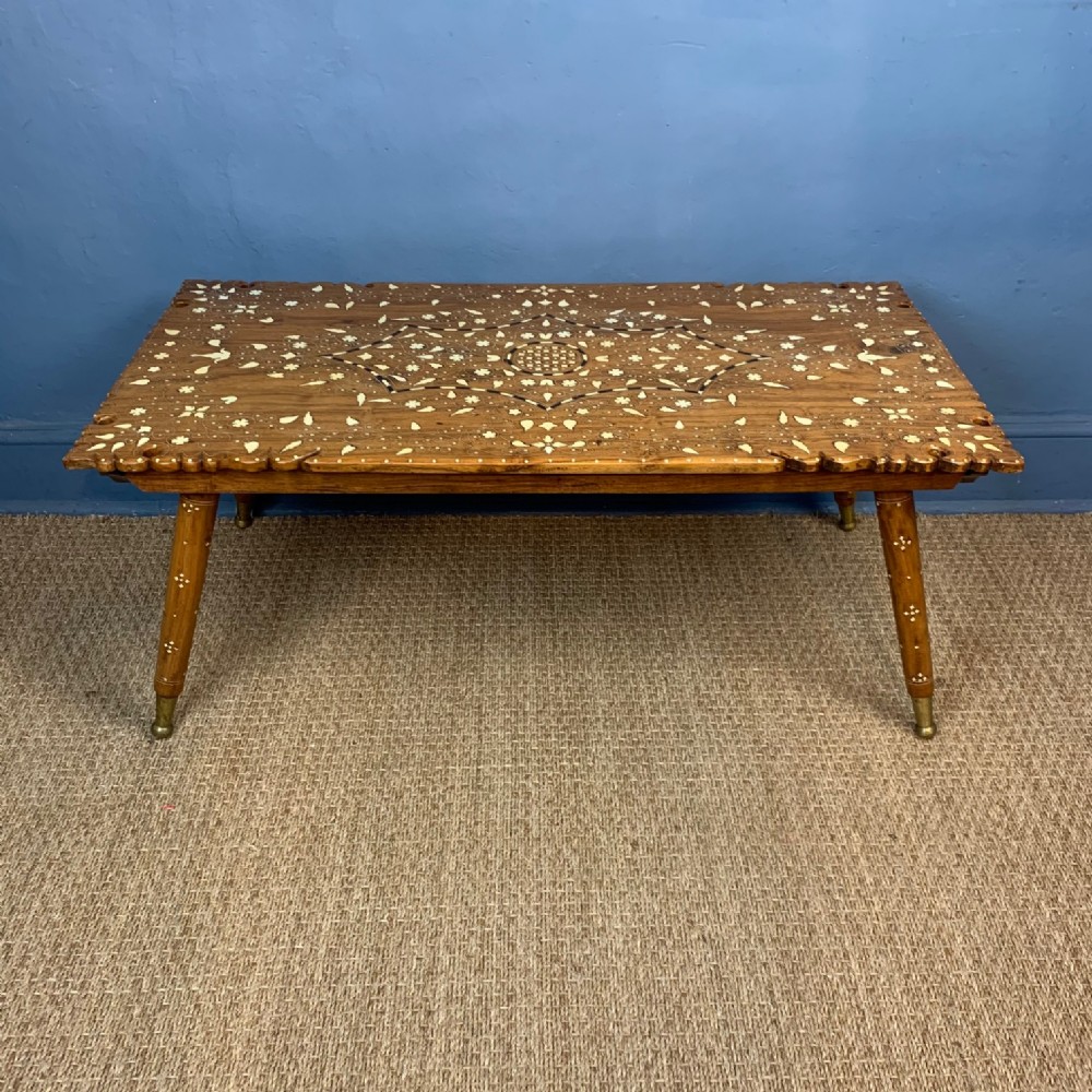A large Hoshiarpur ebony and bone inlaid coffee table circa 1930