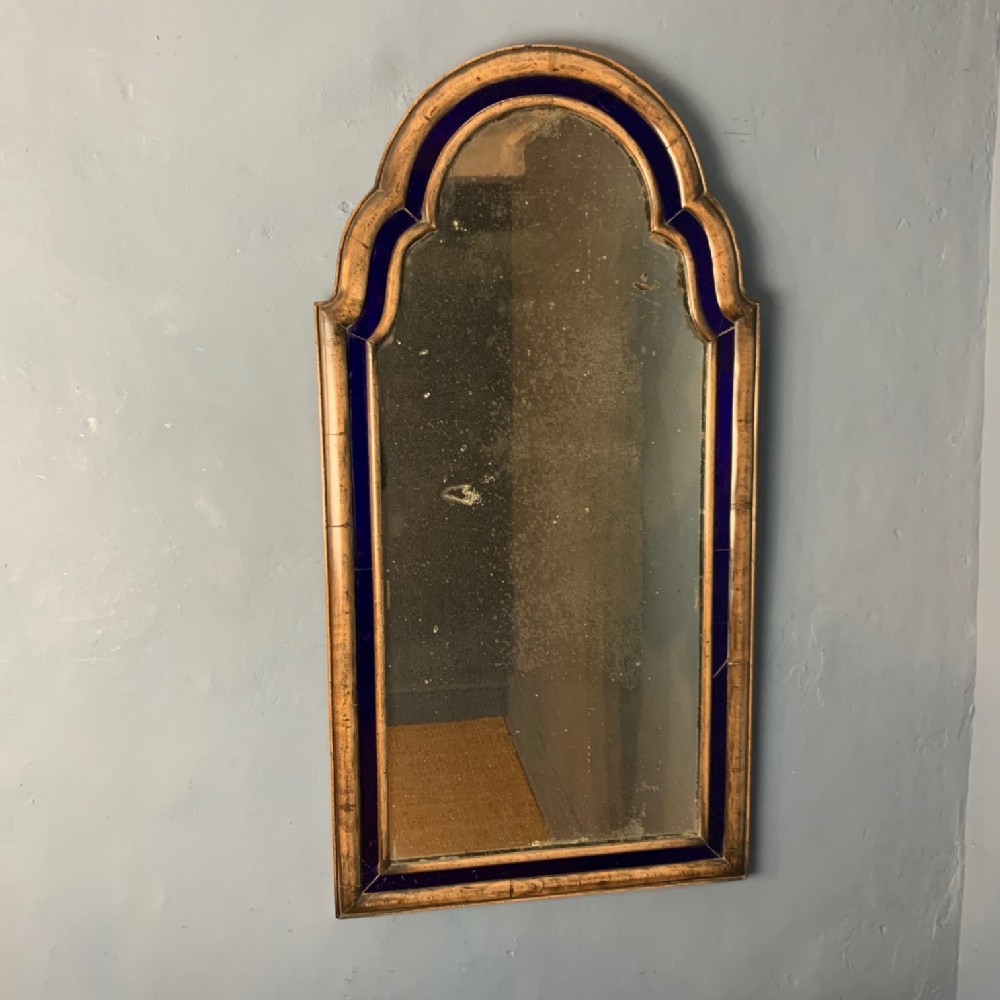 A Queen Anne style silvered arched border glass mirror circa 1900 