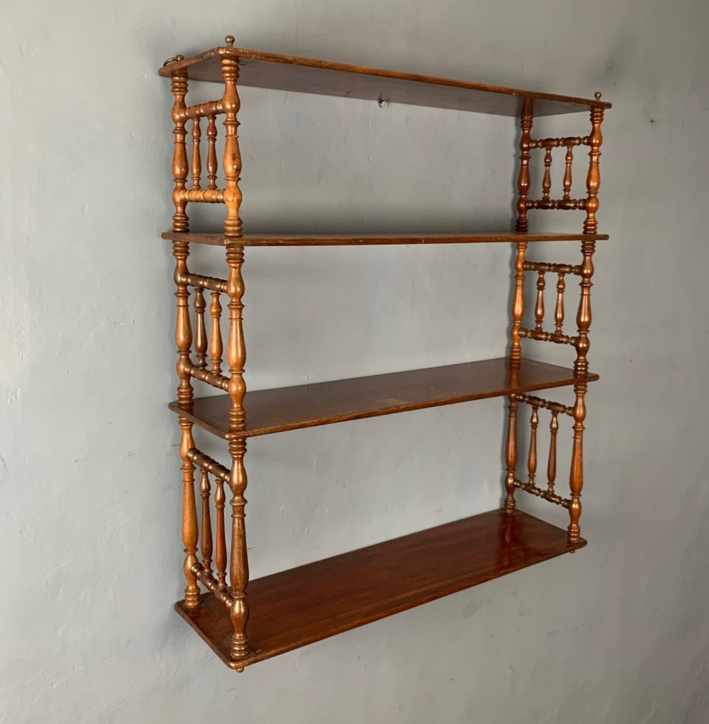 A set of early 19th century mahogany Bobbin turned four tier wall shelves circa 1830