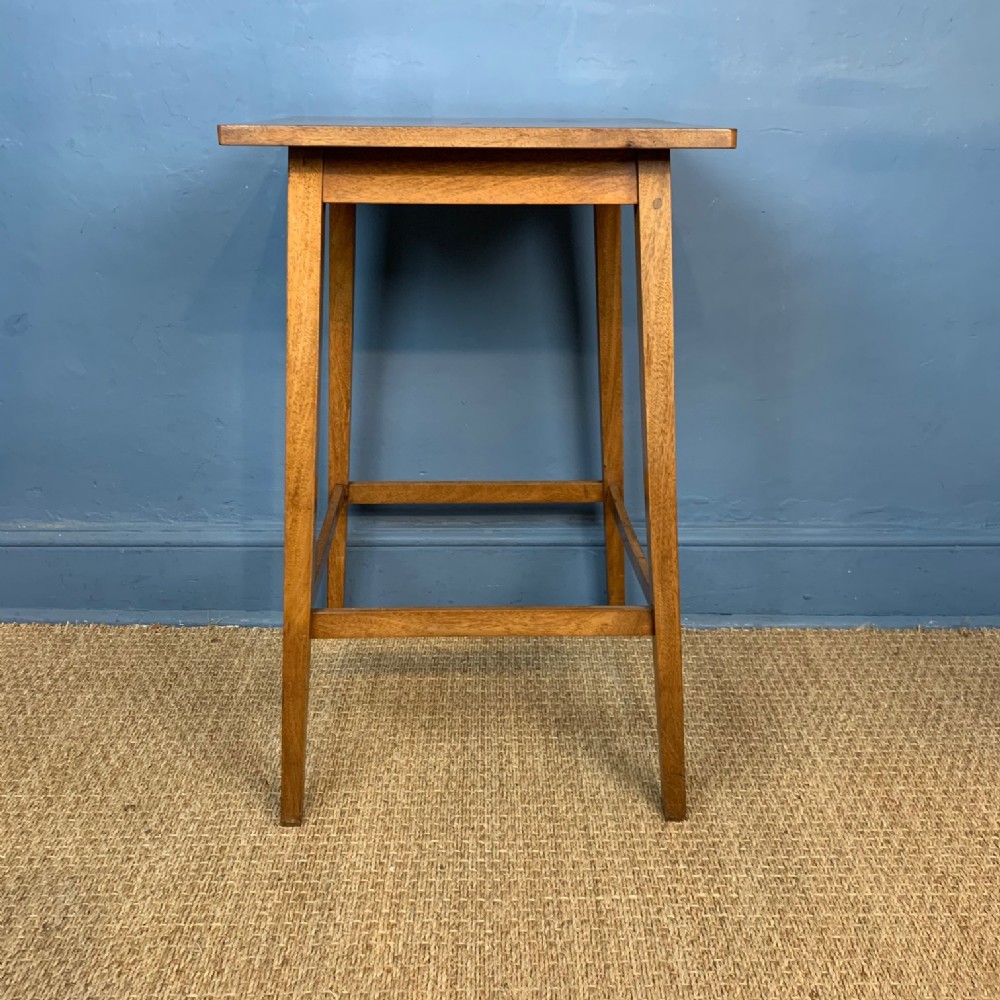 An Edwardian walnut tall table circa 1910