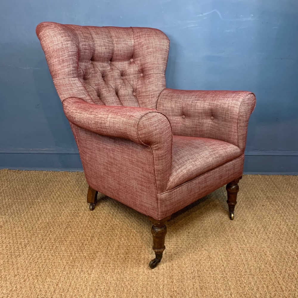 A large Victorian button back armchair c 1890 