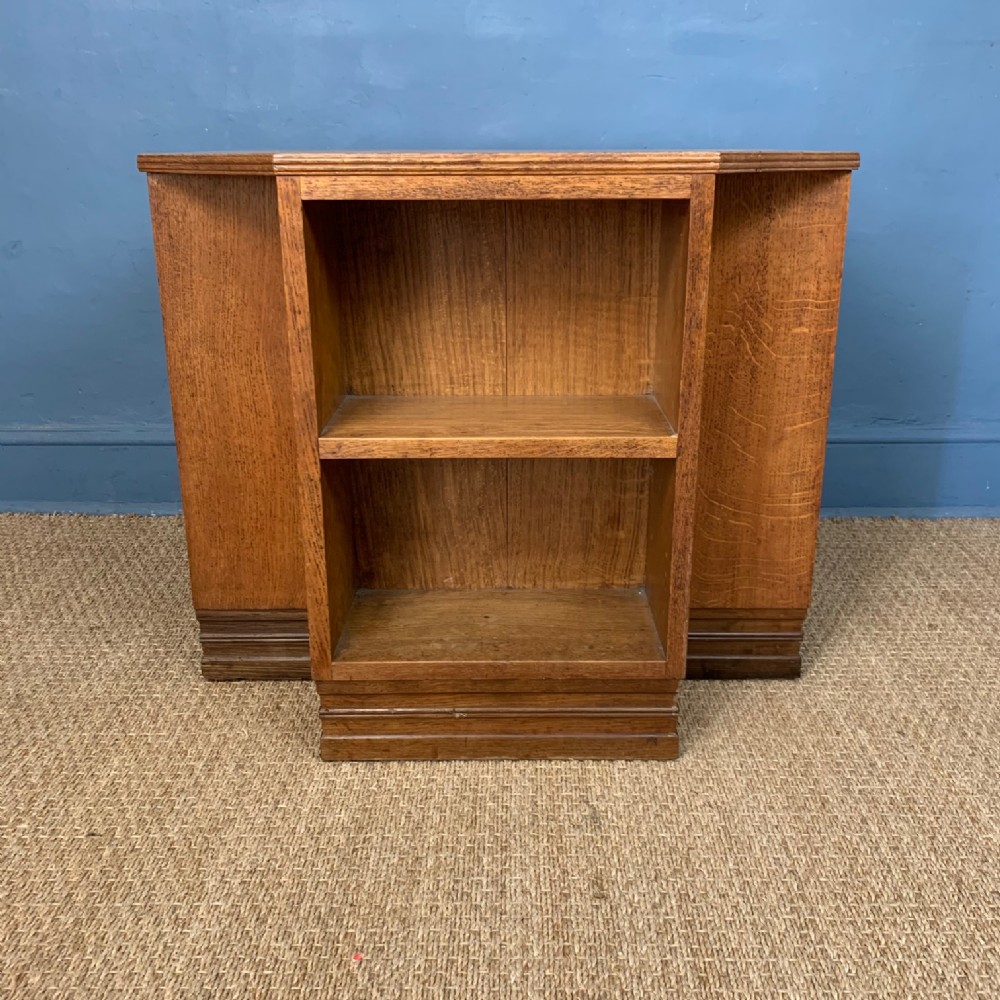 A large Edwardian oak octagonal book table circa 1910 