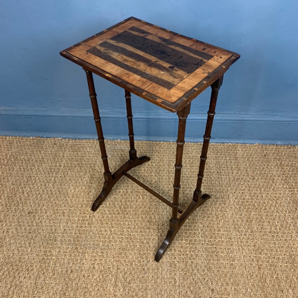 A George IV laburnum veneered lamp table circa 1825 