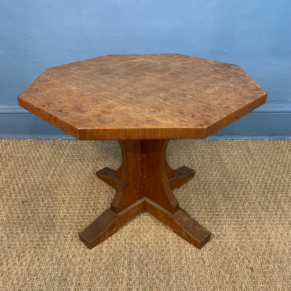 An English Arts and Crafts oak octagonal coffee table circa 1930 