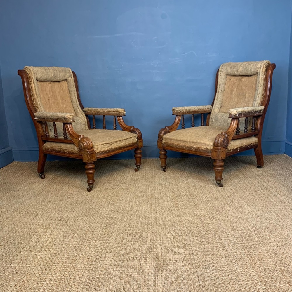A pair of early Victorian oak library chairs circa 1860