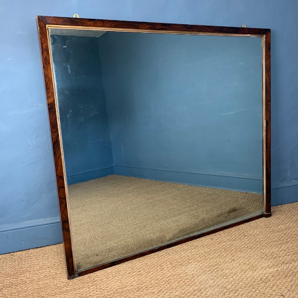 A large mid 19th c rosewood over mantel mirror circa 1850 
