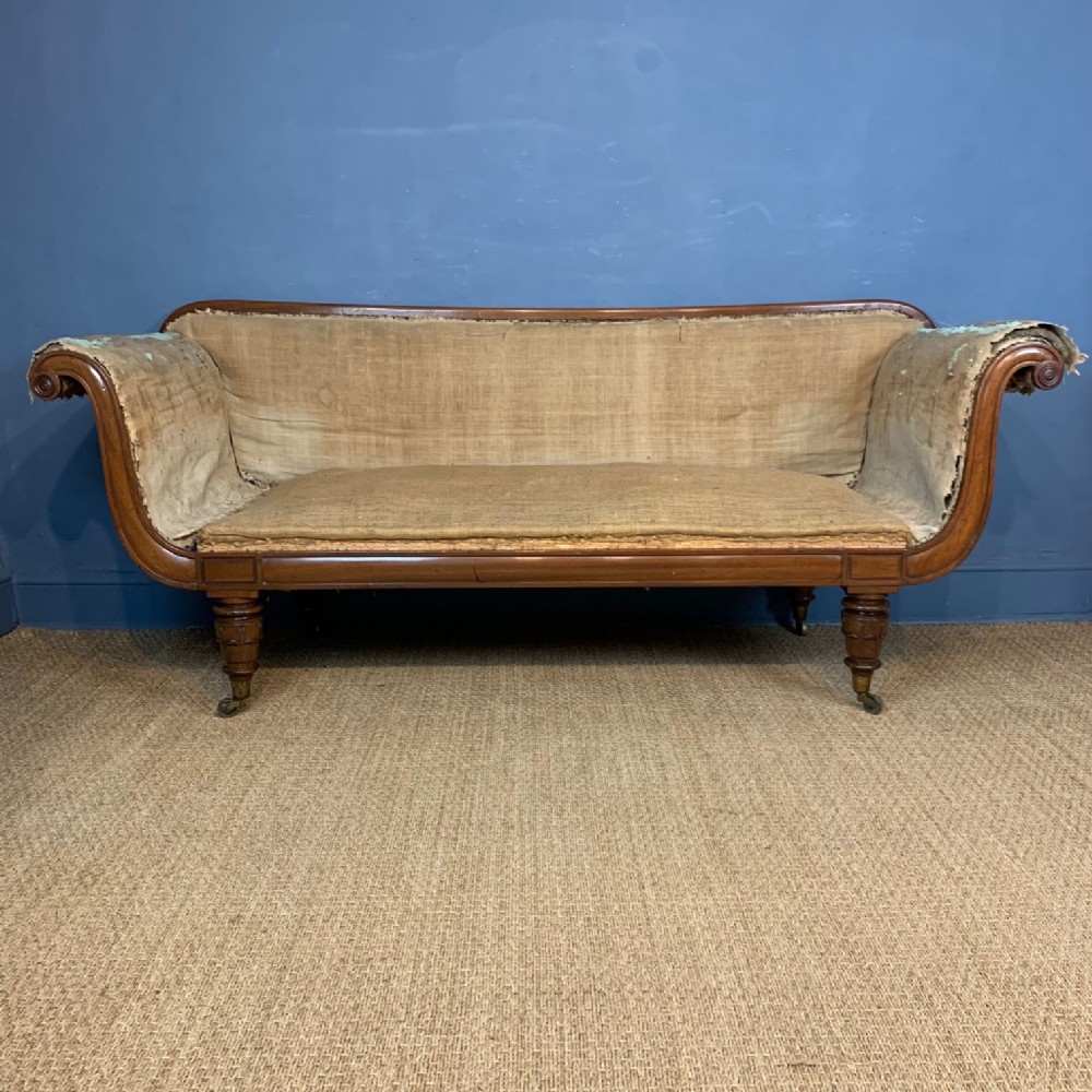 A George 1V mahogany scroll end sofa circa 1830
