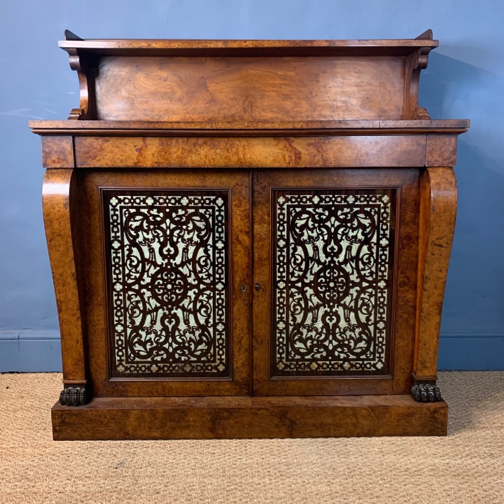 A George IV burr elm side cabinet circa 1825