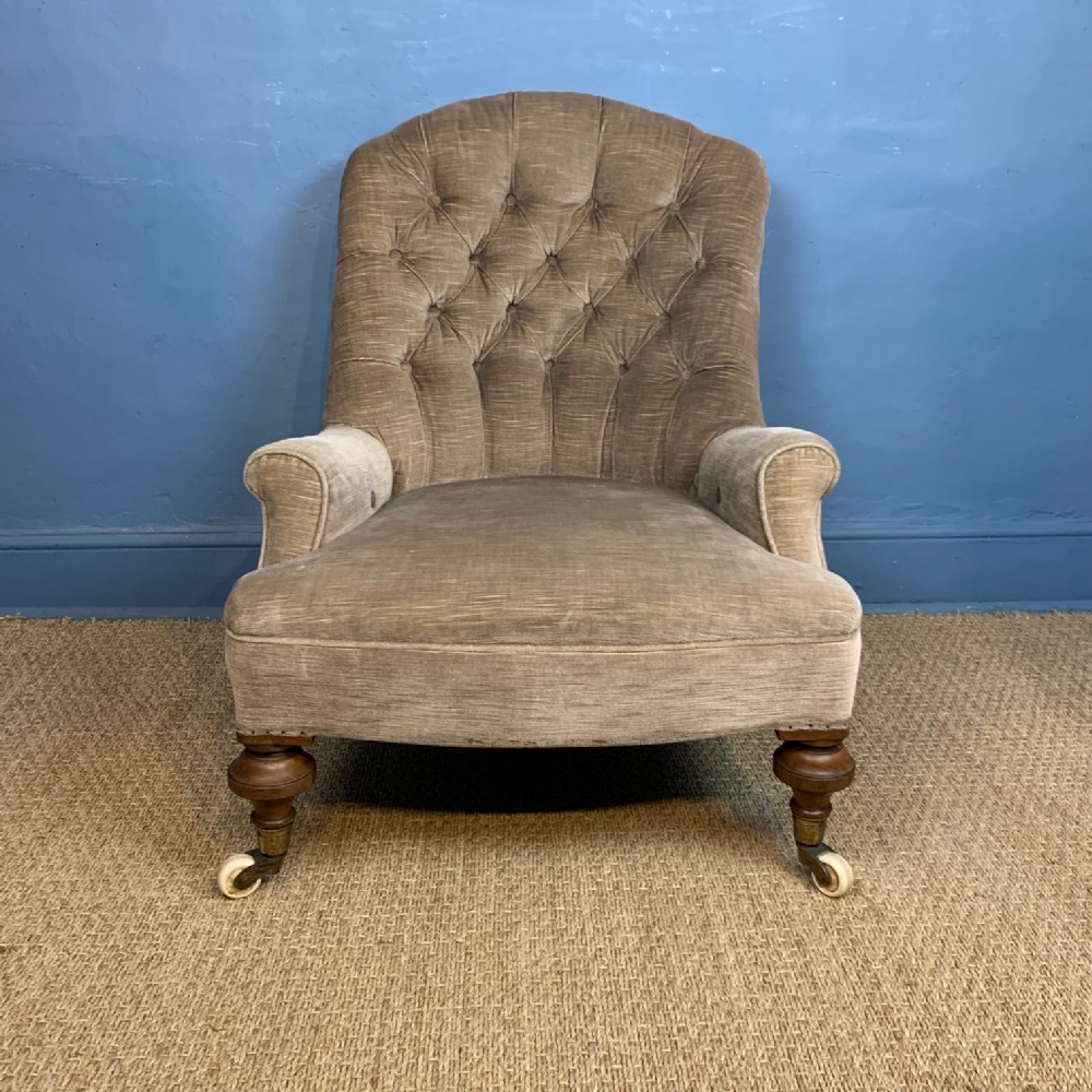 A large Victorian walnut nursing chair circa 1870
