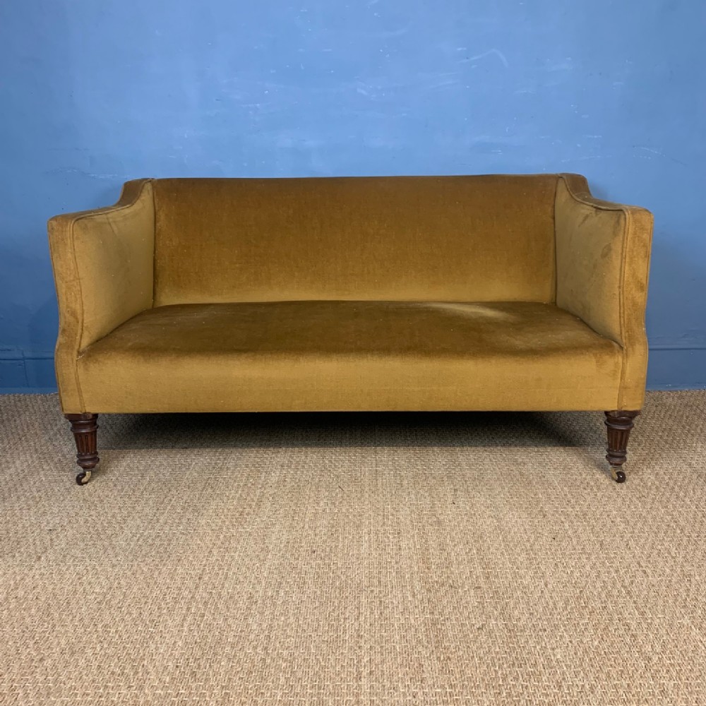 A Victorian 2 seater sofa by Trollope and Sons London circa 1890