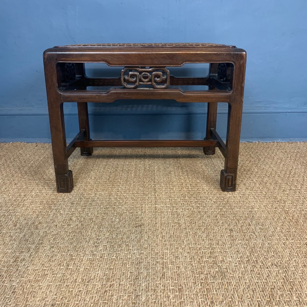 A Wyllie and Lockhead padouk and cane top stool circa 1920