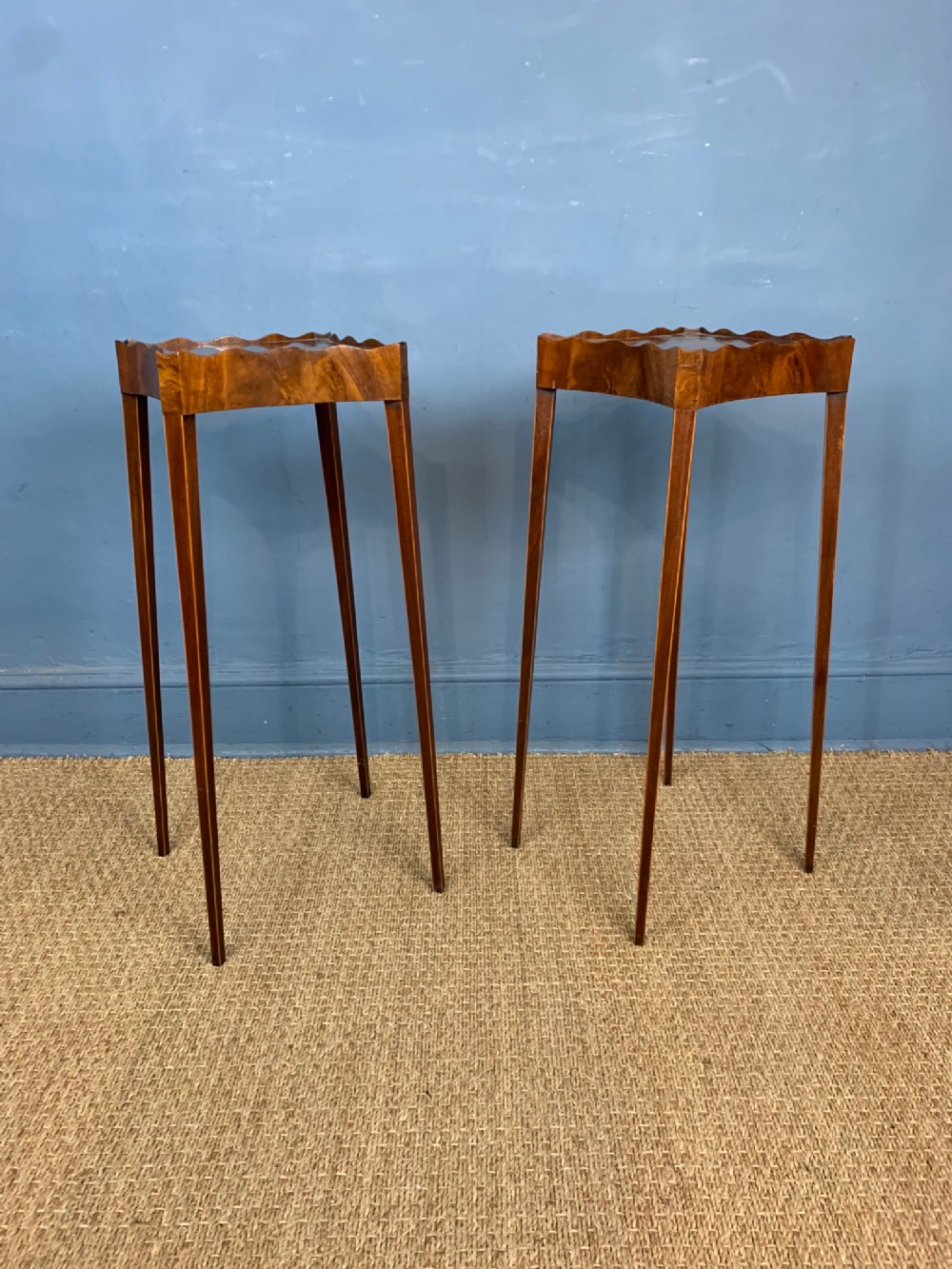 A pair of George III style mahogany urn tables circa 1900