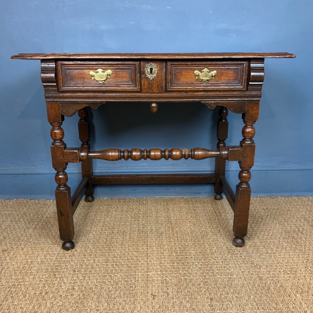 A Charles II oak side table circa 1670