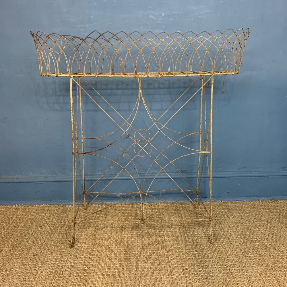 A late Regency white painted wirework planter circa 1830. 