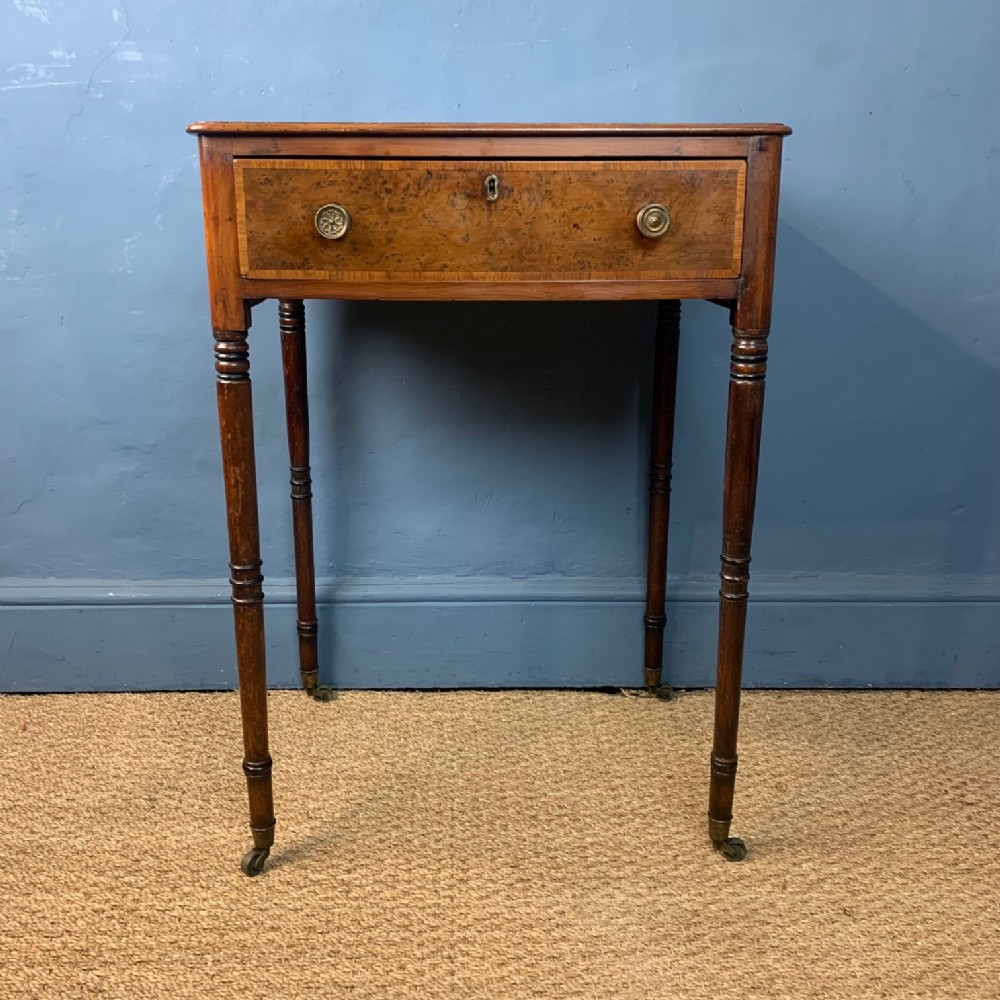 A George IV yew and burr yew lamp table circa 1820
