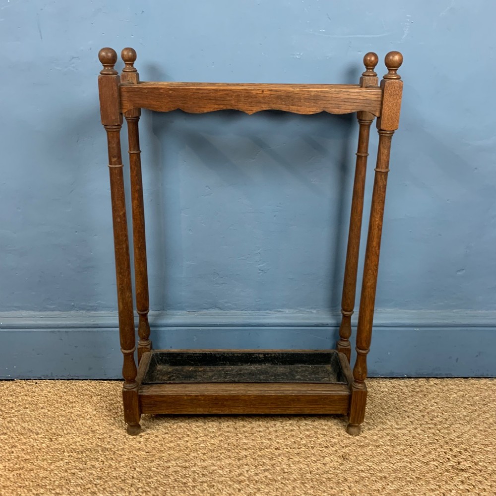 An Edwardian oak stick stand circa 1910